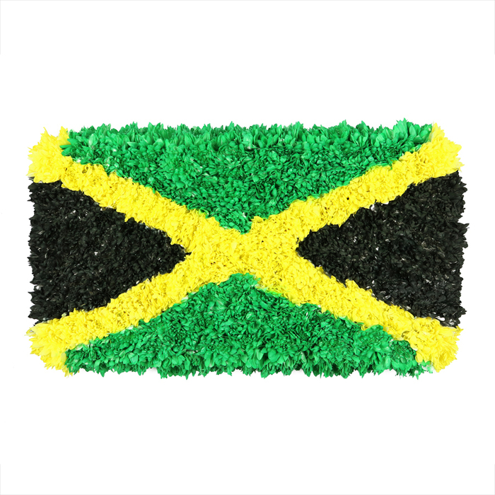 A vibrant and intricately textured representation of the Jamaican flag, assembled from densely packed, small crinkled pieces of material-perhaps recycled paper, fabric scraps, or upcycled plastics-giving a rich, tactile surface. 

The bold gold saltire diagonally crosses the field, created by countless shimmering fragments that meet at the center in a bright blaze. The top and bottom triangles are emerald green, their greens intensified by the bulging mosaic; the left and right triangles are deep black, matte in tone yet full of subtle sheen where light glances off the irregular edges. The result is a striking three-dimensional effect and a visible unevenness that speaks to handmade craft and communal effort. The entire work sits on a clean white background, allowing the colors to radiate and the texture to be felt even without touch. This artistic interpretation stands as a powerful symbol of national pride, culture, and identity, inviting thoughts of sustainability, community art, and the unique ways Jamaican heritage can be expressed in public spaces in North Watford. It's the kind of piece that could accompany articles about heritage celebrations, art in the diaspora, or neighborhood art initiatives-an invitation to reflect on how craft connects people across distances.