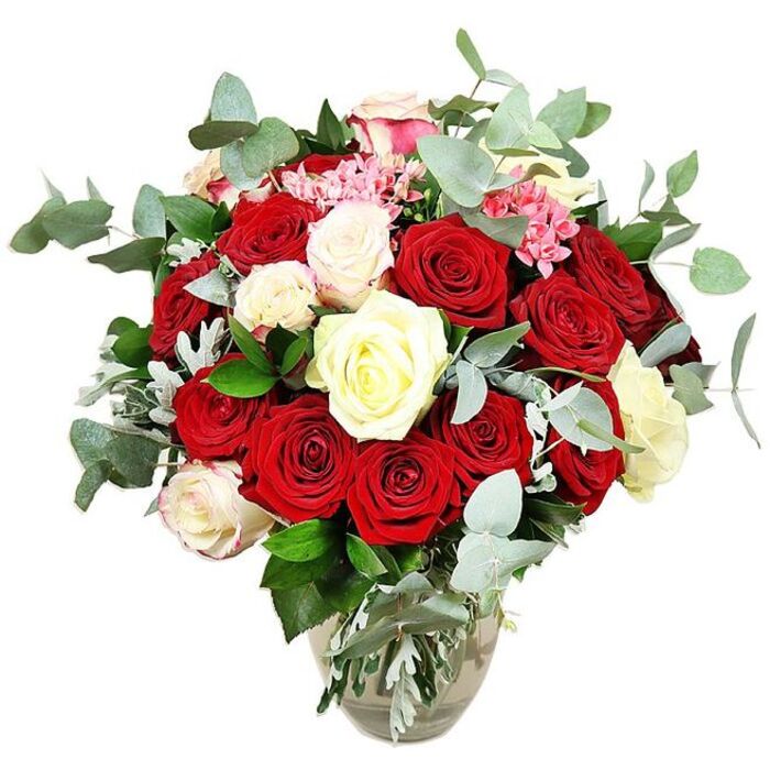 Set against a pristine white backdrop, this luxuriant rose bouquet appears almost to float, its colours and textures captured with a clarity that allows each individual bloom to be imagined in the hand. The arrangement is dominated by scores of deep red and vivid scarlet roses, some still in tight, promising buds, others fully open with plush, velvety petals unfolding in generous layers that speak of enduring love, admiration, and romance. Among these rich hues are scattered elegant white and creamy ivory roses, along with a few white petals delicately blushed at the edges with pale pink, which softly break up the intensity and infuse the bouquet with a feeling of serenity and grace. Small, bright pink filler flowers nestle between the larger roses, creating little pockets of texture and colour that lend an almost whimsical charm. Flowing through the composition are stems of blue-green eucalyptus, their rounded, slightly frosted leaves adding a cool, contemporary contrast and suggesting a refreshing, aromatic scent. Deeper green foliage and subtle silvery-green leaves are tucked carefully among the blooms, building volume and giving the design a balanced, rounded form that feels lush but not overcrowded. The flowers are arranged in a clear glass vase with a gently bulbous base and slimmer neck, the visible stems criss-crossing in the water and grounding the romantic display with everyday simplicity. This bouquet could easily be imagined gracing a dining table in a North Watford flat or townhouse, delivered by Flower Delivery North Watford for a special anniversary, milestone birthday, or intimate celebration, bringing a touch of refined, timeless beauty to homes near Garston, Nascot Wood, or along the quieter residential roads.