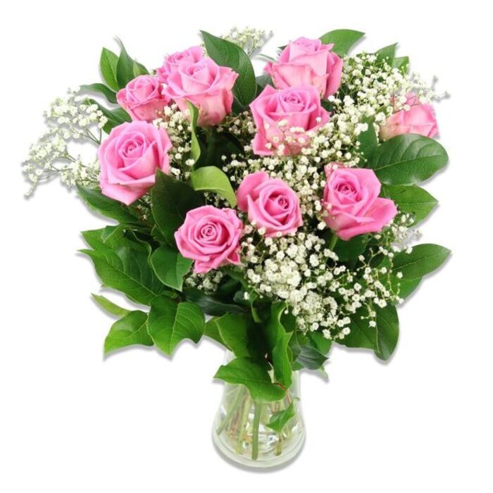 A softly romantic arrangement of pink roses and baby's breath is presented in a clear glass vase, photographed against a pure white background so that every delicate hue and detail is unmistakably visible. Around a dozen roses in shades of classic baby pink form the main focus, their petals layered in tight spirals and gentle ruffles that convey both luxury and warmth. Some roses are fully open, displaying generous, velvety centres, while a few remain in that in-between stage where the outer petals have started to loosen but the heart of the flower is still beautifully cupped, suggesting freshness and a long vase life. Threaded among the pink heads are graceful stems of white Gypsophila, or baby's breath, each one dotted with tiny, cloud-like blossoms. These soft white accents create a misty, almost ethereal texture that makes the bouquet feel lighter and more airy, like a quiet celebration of new beginnings. Dark, glossy green leaves cradle the blooms, framing the pink and white palette with a natural richness that enhances their colours without overwhelming them. All of the stems are gathered into a simple, cylindrical glass vase, half-filled with clear water, where the straight green stems can be seen crossing gently. The lighting is bright and even, with no harsh shadows, highlighting the healthy petals and freshly cut greenery, much like natural daylight streaming into a North Watford nursery window. This bouquet feels ideal for welcoming a newborn baby girl to a home near Garston, sending heartfelt congratulations to local parents, or adding a serene, joyful touch to a christening celebration around North Watford.