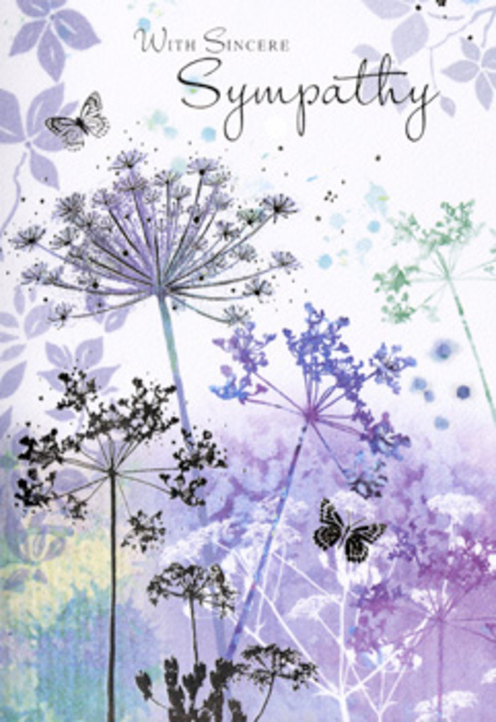 The design of this funeral sympathy card carries a tranquil, meditative quality that resonates with many families in North Watford who visit our shop after a service. On opening it, you're met with a vertical sweep of wild, spindly umbelliferous flowers, their stems fine as threads and their filigree heads drawn in delicate strokes of violet, lavender, and powdery blue. They rise from a low horizon of soft, blurred colour, much like the gentle haze that sometimes settles over Cassiobury Park or the quiet streets off St Albans Road on a cool, early evening. Each bloom feels individually considered yet part of a harmonious whole, the petals suggested with subtle dots and feathery lines that create a sense of lightness and air. The background is a wash of watercolour tones-pale lilac merging into smoky grey-blue and soft sage-soothing on the eyes, like watching clouds drift past. Two butterflies hover above the finest stems, rendered with translucent wings that echo the cool palette, hinting at continuity, transition, and the delicate thread between presence and memory. There is no clutter, no sharp edges, only a gentle flow of shapes and muted colours that invite reflection. As a local florist familiar with the quiet moments in homes across North Watford after a funeral, I sense how this card offers more than a written message; it becomes a calm space for breathing and remembering a loved one. The artistry feels respectful and reassuring, perfectly suited to accompany a simple wreath, a natural hand-tied tribute, or a single, elegant sympathy bouquet delivered to nearby addresses and chapels.