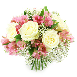 A lush, dome-shaped bouquet of fresh flowers rests against a pure white background, its soft colours and textures carefully arranged to create a feeling of calm joy and refined elegance. At the centre, multiple creamy white roses open in full bloom, each flower composed of tightly layered petals that swirl outward like satin, with a whisper of pale yellow deep in the heart adding warmth and depth. Tucked between these classic roses are clusters of pink alstroemeria, their slender, trumpet-like blossoms shaded from gentle pastel pink at the tips to more vivid fuchsia tones towards the centre, where fine burgundy streaks and speckles provide intricate detail. Delicate sprays of baby's breath thread through the bouquet, their countless tiny white buds and open blooms forming a soft veil that lightens the overall composition and gives it a dreamy, almost cloud-like quality. Dark and mid-green foliage peeks from around the flowers, framing them with a natural contrast and reinforcing the sense of freshly cut garden stems. At the base, the green stems are tightly bound, suggesting a professionally hand-tied bouquet that could be placed straight into a favourite vase on a North Watford kitchen table or living room sideboard. The bright, even lighting brings clarity to every petal edge and subtle colour shift, without harsh shadows, so the arrangement appears crisp and fresh, as if just prepared by a local florist. This bouquet radiates gentle affection and sincerity, ideal for birthdays, anniversaries, or thoughtful get-well wishes delivered to homes, workplaces, and hospitals across North Watford and the surrounding area.