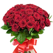A spectacle of romance and devotion, this striking bouquet displays approximately fifty to sixty radiant red roses, masterfully gathered to create a full, domed arrangement that feels both sumptuous and inviting-a true ode to North Watford's vibrant spirit. Each rose boasts velvety petals in deep, saturated hues of crimson, with a harmony of tightly wound buds and blossoms in varied stages of opening, adding visual rhythm and intrigue. Carefully interspersed amongst the roses, the foliage shimmers with a healthy dark green gloss, mirroring the lush greenery seen near the heart of Watford Fields on a bright day. The bouquet's stems are seamlessly bundled and finished with a wide, crimson satin ribbon, its broad bow and flowing tails imparting a touch of sophistication and celebration that local residents recognize as suitable for anniversaries, heartfelt proposals, or grand romantic gestures. Bright, even lighting enhances the bouquet's intense colors, making each flower appear almost luminous against the clean white background, underscoring the freshness and quality expected from a local North Watford florist. This arrangement is more than simply a collection of flowers-it is a powerful symbol of enduring affection and beauty, expertly crafted to elevate life's most meaningful moments across the community.