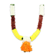 A vivid U-shaped artificial flower garland is photographed against a clean white background, its handmade rhythm of colour and texture clearly visible. The garland begins at the top of each arm with densely packed, creamy white florets-soft, chrysanthemum-like pom-poms that read as gentle and pure against the studio light. Below those, a narrow band of deep reddish-brown elements adds weight and contrast; these pieces are layered and slightly flattened, mimicking dried petals or mahogany-tinged bracts and giving the toran a grounded, earthy counterpoint. As the arms sweep down, the dominant curve is formed of tightly threaded, bright golden-yellow clusters that strongly evoke fresh marigolds in both shape and buoyant texture, their tiny ruffled petals creating a plush, sunlit surface. Small bright green leaf-like accents are set between the colour blocks, neat interruptions that suggest foliage or stitched ribbon joins. At the lowest central point a generous pendant hangs: a rounded, multi-layered cluster of vivid orange ruffles that acts as the visual heart of the piece, a marigold-inspired focal pom-pom that catches the eye. The materials appear artificial-silky polymer or woven yarn-chosen for durability and a satiny sheen under soft studio lighting; you can almost feel the slightly resilient touch of synthetic petals and the reassuring weight of dense threading. This toran reads both ceremonial and welcoming, the colours and form suited to puja altars, doorways, and festival entrances; it's the sort of decoration you might see brightening doorways near Cassiobury Park or along residential streets in North Watford during Diwali, Ganesh Chaturthi, weddings, or other auspicious gatherings.