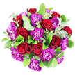Top-down image of an opulent floral bouquet placed against a bright white backdrop, showcasing an artful mix of velvety red roses, vivid purple carnations, and layered green foliage, crafted with the polished touch of a North Watford florist. The bouquet is tightly composed into a generous, rounded shape, so the blooms seem to press gently against one another in a harmonious, abundant cluster. Each rose is a deep, romantic crimson, its petals thick and soft, spiralling inward to form a classic heart-like centre that speaks of devotion and affection. Nestled closely between them, purple carnations add a different kind of beauty; their petals are thin, softly frilled, and densely layered, forming small, ruffled pom-poms of colour that range from royal purple to a slightly pinkish hue at the outer edges. Around and beneath the blooms, an array of glossy dark green leaves fans out, providing contrast and structure, while soft sprigs of eucalyptus with their round, silvery-green leaves weave delicately through the design, adding coolness and a subtle, airy rhythm. The white background isolates the bouquet, making every shade of red, purple, and green appear more intense and defined, as if the flowers were spotlighted in a calm studio just off St Albans Road. This arrangement feels tailor-made for anniversaries, romantic surprises, or special celebrations at home in North Watford, radiating warmth, celebration, and care through its carefully balanced colours, luxuriant textures, and the sense that every stem has been thoughtfully placed to create a rich, emotional impact.