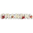 Displayed against a bright white background, this custom funeral tribute spells out GRANDMA in bold, freestanding floral letters that look ready to be set along the front of a service or beside a coffin in North Watford. Each letter is carefully shaped from densely packed white cushion chrysanthemums, their small, rounded heads overlapping to create a soft, velvety carpet of petals. The whiteness of the blooms suggests purity and peace, while a fine edging of pale lilac or light purple ribbon gently outlines each character, adding depth and a serene, almost halo-like effect. Vivid red flowers are placed with intention throughout the design. On the G, a lush grouping of deep red roses is nestled alongside a distinctive red-and-white variegated calla lily, whose curved form and patterned petals bring a unique flourish. The first A is anchored by a single, heart-shaped red anthurium with a glossy, almost porcelain finish. Moving along the tribute, the M carries another cluster of red roses together with a red anthurium, creating a rich focal point at the centre of the word. The final A repeats this note of love with a solitary red anthurium, visually linking the beginning and end of the tribute. Hints of dark green foliage and a slim green frame peek out behind the letters, offering structure while remaining unobtrusive. The overall effect is one of quiet elegance and heartfelt devotion, the kind of personalised GRANDMA lettering a family in North Watford might choose to express deep affection and gratitude at a funeral or memorial gathering.