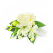 Set against a flawless white backdrop, this elegant corsage reads like a quiet poem in ivory and green. At its heart sits a fully opened, creamy white rose whose velvety petals curl tightly in the centre and unfurl outward in soft, layered waves that catch a tender, morning light; the subtle shadows between the layers give the bloom a gentle depth and a sense of living warmth. To either side, slender alstroemeria - the Peruvian lily - opens in delicate ivory petals, their slightly elongated shapes offering a graceful contrast to the rose's rounded fullness, while two elongated green buds at the far left promise the softness of future blooms. Nestled below, a spray of miniature, daisy-like flowers with tiny yellow centres adds a playful, countryside note and fine, detailed texture to the composition. Broad, deep-green leaves form a lush base, their smooth surfaces and rich colour framing the whites and anchoring the piece with a natural, structured support. On the right, a small cluster of lustrous, white pearls is tucked among the foliage, their satin sheen and bead-like presence lending a whisper of bridal tradition and classic jewellery charm. The overall effect is refined and tender-a corsage crafted for weddings, prom evenings, or a formal celebration-radiating purity, understated luxury, and the intimacy of a small keepsake. As a local floral touch, this arrangement would sit quietly elegant on a lapel or wrist for a ceremony in North Watford, its colours and textures photographed faithfully against the pristine white background so every delicate detail is visible and true.