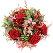 From a bird's-eye perspective against a bright white background, this hand-tied bouquet appears as a perfectly rounded celebration of red, pink, and green, crafted with the care you'd expect from a local North Watford florist. The central focus is on several sumptuous deep red roses, fully open and velvety, their layered petals curling outward to form rich, romantic spirals that almost seem to glow. Around and between these classic blooms, dainty pale pink waxflowers weave like a delicate lace, each miniature star-shaped blossom with its soft yellow centre adding both texture and a lighter, playful touch. A generous halo of greenery frames the flowers, with leaves in varied shades of green that look freshly cut-some broad and strong, others more slender and gently arched-creating a sense of movement and natural abundance. Threaded through this foliage are distinctive accent leaves in burgundy, bronzed copper, and warm reddish brown, several with clearly etched veins that catch the light and introduce a subtle, sophisticated autumnal note, reminiscent of tree canopies around nearby Cassiobury-bound walks. Deeper within the arrangement, smaller darker red flowers, akin to petite alstroemeria or bell-shaped blooms, add further layers of crimson intensity, pulling the eye in and enhancing the bouquet's depth. The whole design forms a full, dome-like shape that feels generous yet composed, ideal as a centrepiece on a North Watford dining table or as an impressive doorstep surprise. At the base, a glimpse of red and white patterned tag or ribbon hints at careful wrapping and thoughtful presentation, ready for local delivery. The overall effect is one of passionate elegance and heartfelt celebration, well suited to anniversaries, romantic surprises, festive gatherings, or any special occasion where deep affection deserves to be seen and felt.